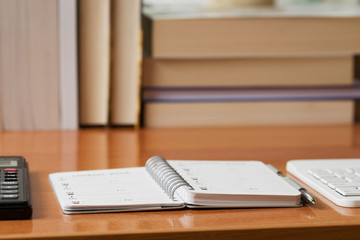 Office desk table with computer, supplies. Copy space for text