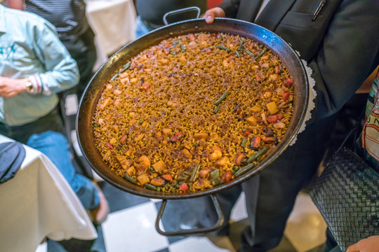 Spanish food ; paella with seafood, shrimps, squid, oyster, saffron in a big dish.
- traditional tasty dinner
