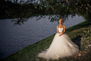Fototapeta na wymiar amazing bride spend free time in nature