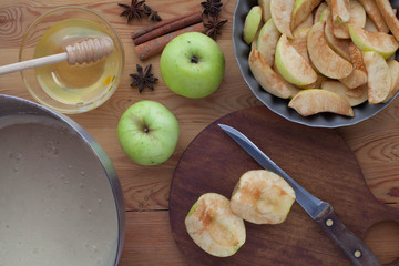 Cooking apple pie - Charlotte on wood background