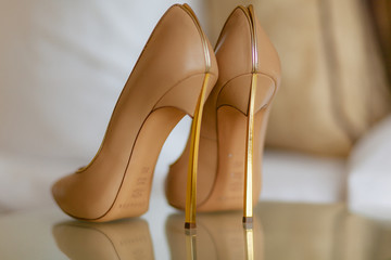 Luxury bridal shoes on the high heels