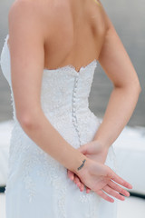 Back of the lace wedding dress with the buttons