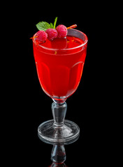 Red alcohol cocktail with raspberries and mint isolated