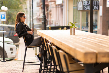 Woman in the street cafe