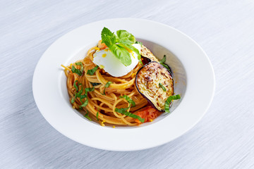 Italian Pasta with eggplants, tomato, ricotta cheese and basil