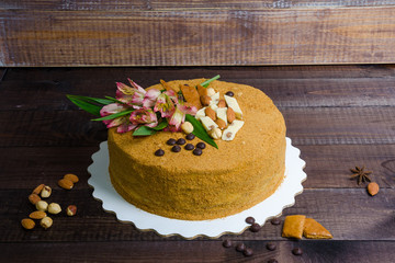 delicious gentle honey cake with flowers and nuts