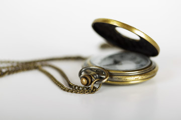 Naklejka premium Pocket watch against a light background