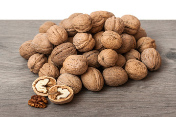 Group of walnuts on wooden surface. Natural health food