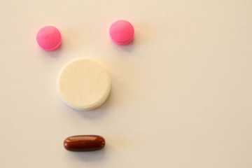 Pill Emoticon Face. Pills with emotions and face on a white background. 
