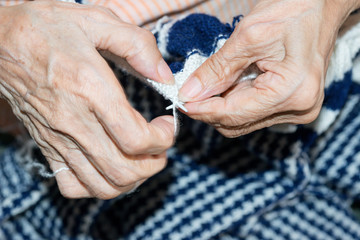 Obraz premium Detail of a person knitting