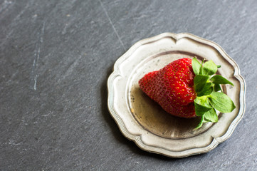 Fresh strawberries on  rustic background
