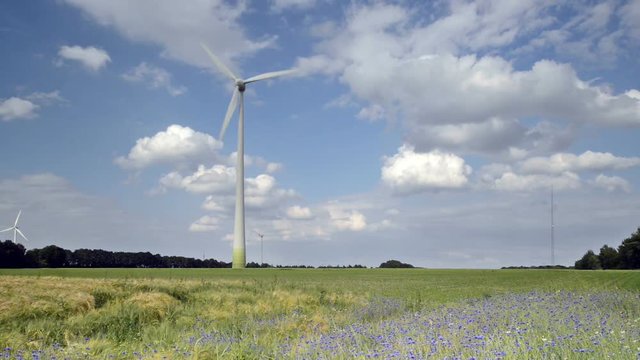 A wind turbine with beautiful sky.