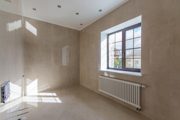 Empty bathroom without equipment in a new modern house