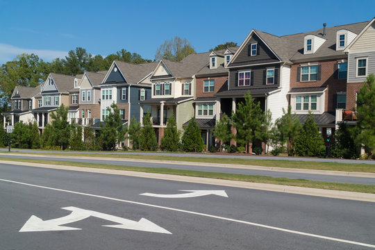 Row of town homes along a parkway