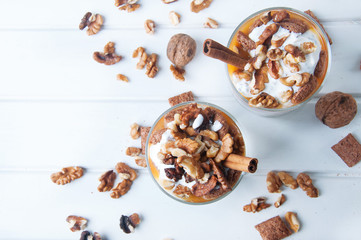 Chia seeds pumpkin spicy pudding with cinnamon and nuts