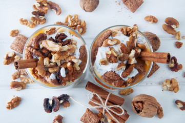 Chia seeds pumpkin spicy pudding with cinnamon and nuts