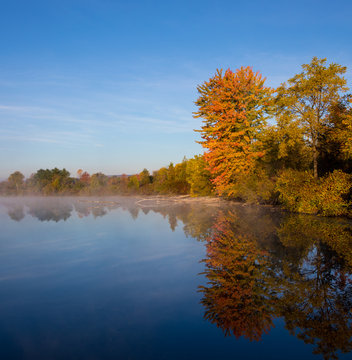 Fall Colors with lake reflection © Jon