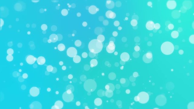 Abstract holiday background with white bokeh lights flickering on blue turquoise green gradient backdrop.