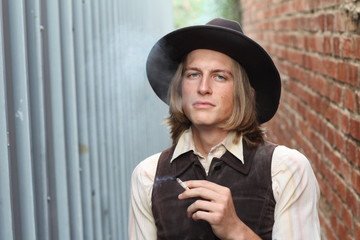 Gunman in the old wild west smking close up