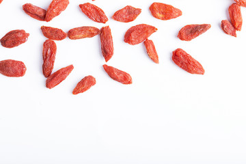 Goji berries on the white background