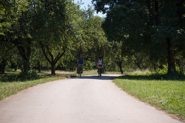 Young multiethnic couple having a bike ride in nature