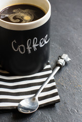 Cup of coffee  and stripped napkin