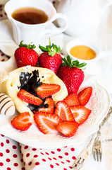 Freh strawberries and crepes