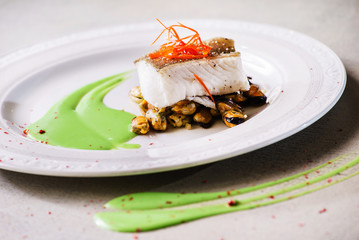 roasted fish steak with mussels