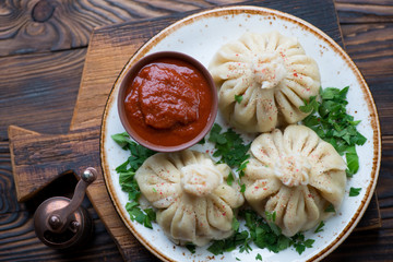 Close-up of khinkali - georgian dumplings with meat stuffing