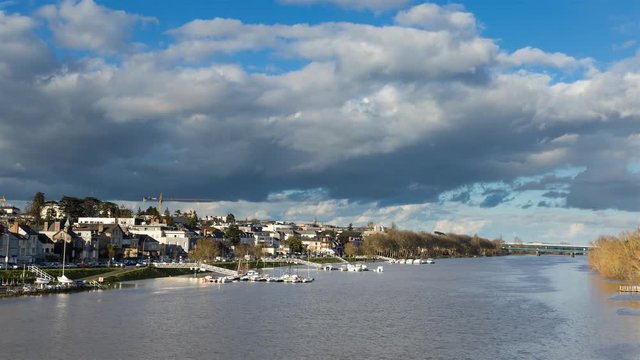 La Maine River in Angers, France with Rainbow and Clouds Day Timelapse