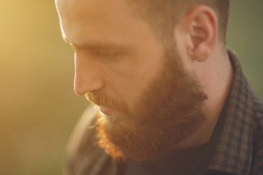 portrait of a handsome young man with a beard
