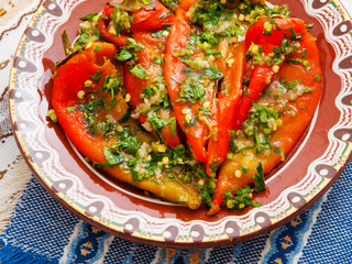 Marinated red peppers with garlic, oil and vinegar