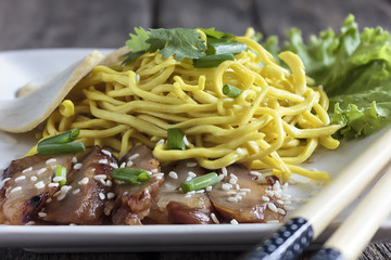 close up dry yellow noodle thai food