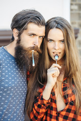 young couple with tea spoon