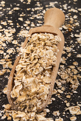 scottish toasted oats in a wooden scoop