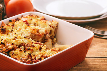 Pastitsio -greek casserole with pasta, meat, tomatoes and feta cheese.