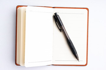 notepad with pen isolated
