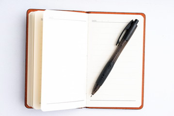 notepad with pen isolated