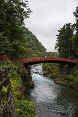 Fototapeta na wymiar Shinkyo (Sacred Bridge) stands at the entrance to Futarasan Shrine.