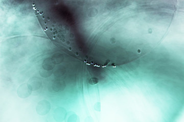 Abstract underwater composition with jelly balls, bubbles and light