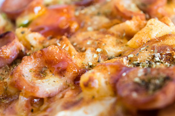 Photo, appetizing pizza with sausage, cheese, tomatoes and mayon