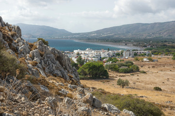 Fototapeta na wymiar Haraki village and Haraki Bay, Rhodes Island, Greece. Haraki is the seaside village on the Greek island of Rhodes, in the Dodecanese. It is situated on Haraki Bay, on the eastern coast.