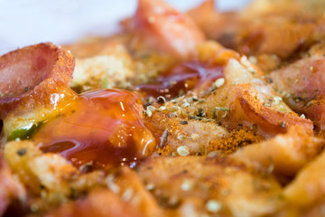 Photo, appetizing pizza with sausage, cheese, tomatoes and mayon