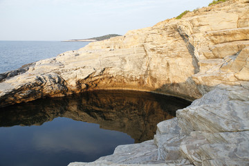 Giola - natural pool in Thassos island, Greece. Beautiful details and reflexions