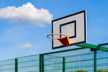 Outdoor basketball backboard with hoop