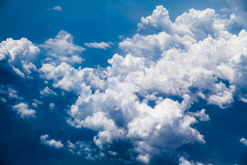 Beautiful, dramatic clouds and sky viewed from the plane. High resolution and quality