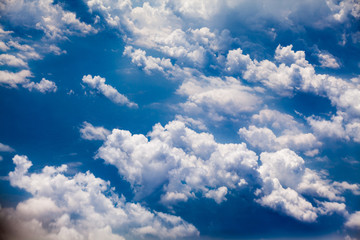 Naklejka premium Beautiful, dramatic clouds and sky viewed from the plane. High resolution and quality