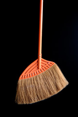 broom on black background