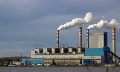 Konin, Poland. Working power station, smoking chimneys.