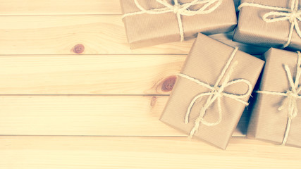 Rustic parcels gift box with kraft paper.